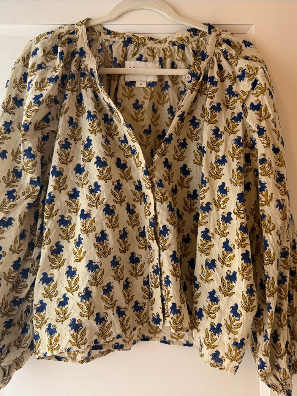 The Shirt by Rochelle Behrens Cream Blouse with Blue and Mustard Floral Print.
